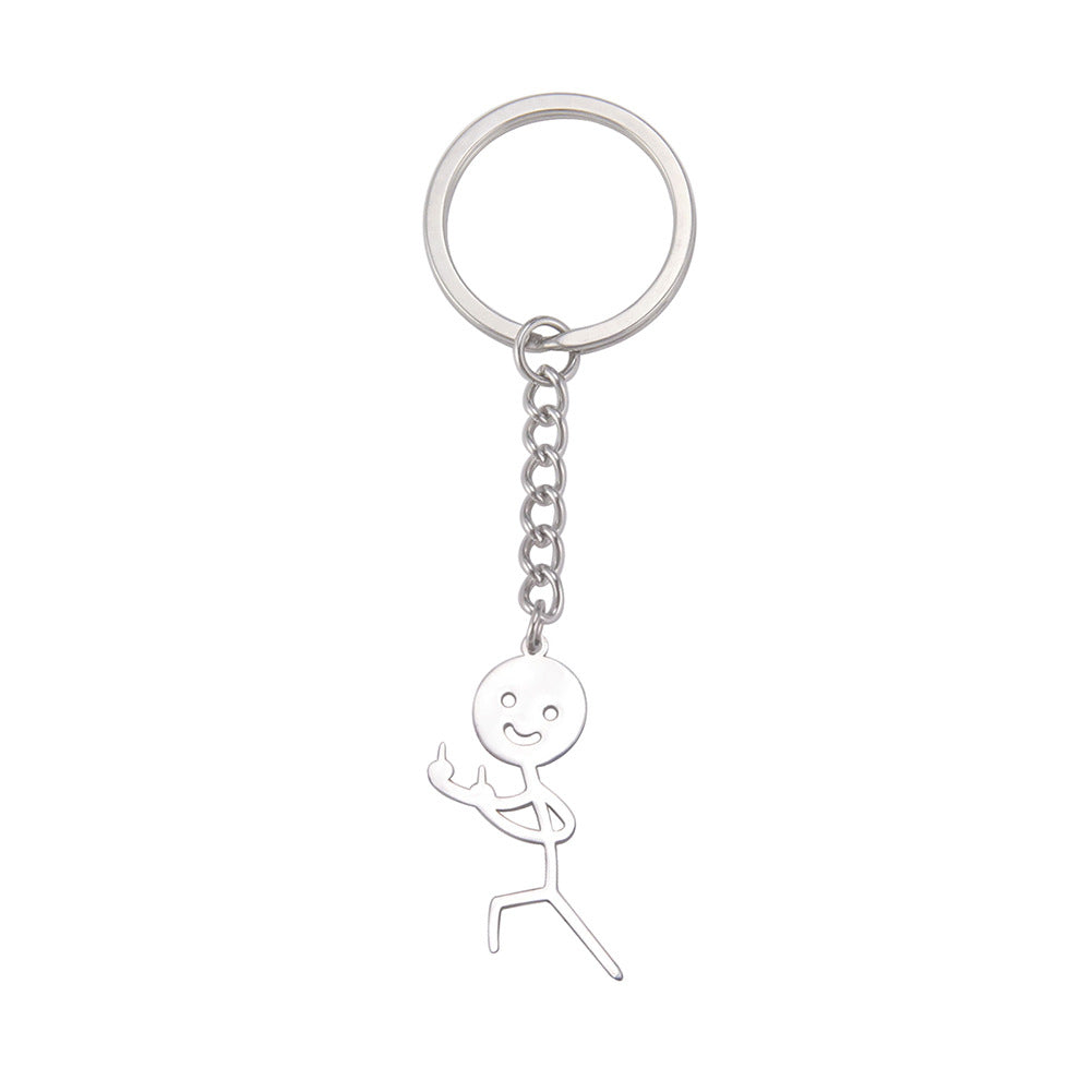 Cute And Creative Emoji Pendant Featuring A Little Figure Giving Two Middle Fingers On One Side Made From Stainless Steel As A Keychain